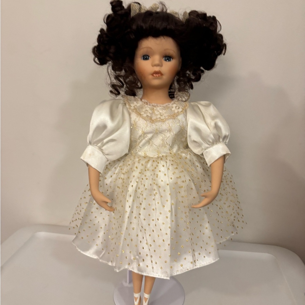 Charming White and Gold Doll with Curly Hair